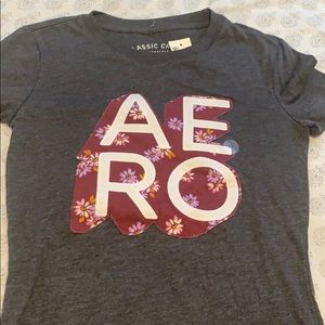 Aeropastel gray shirt with purple lettering